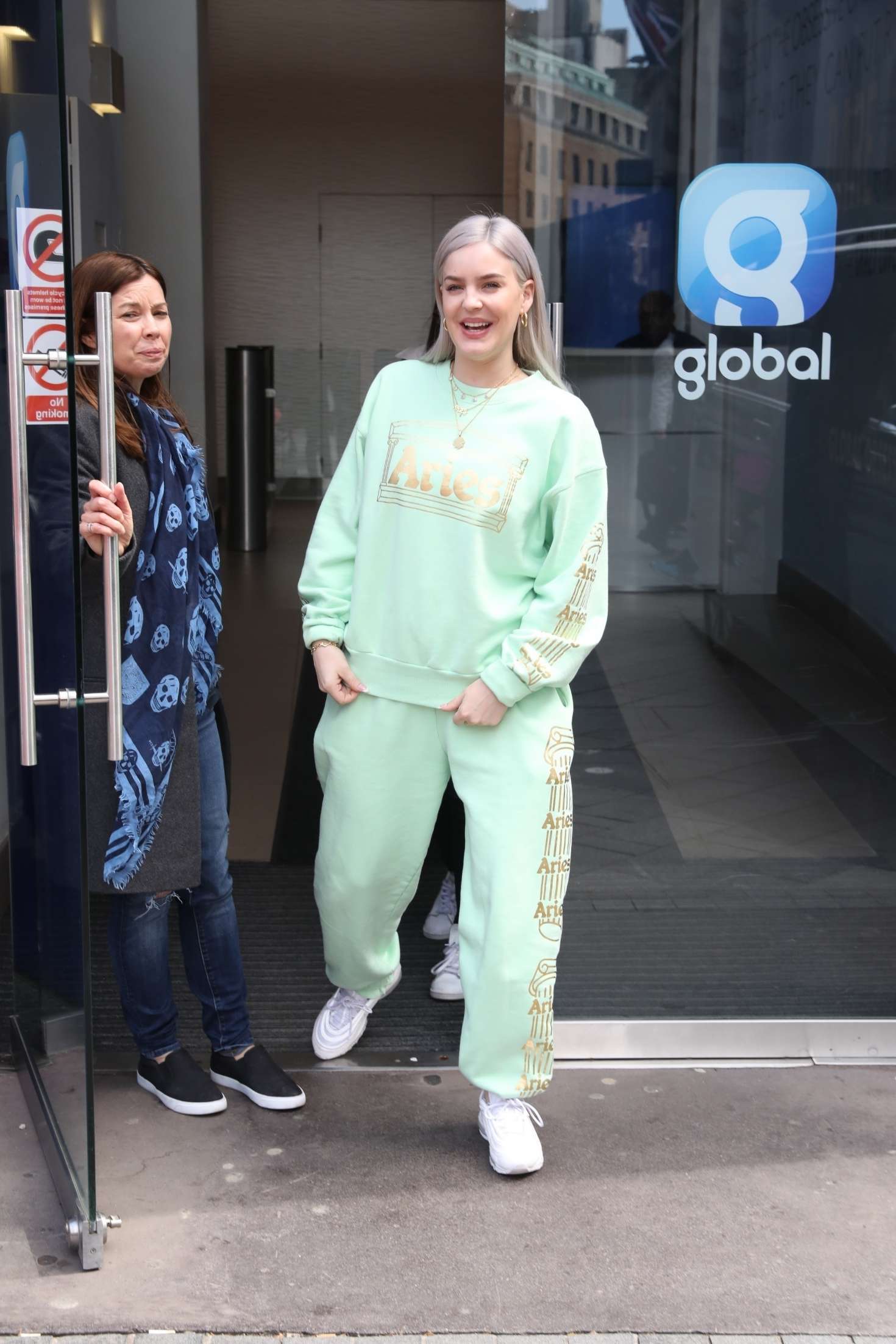 Anne-Marie in Green Sweatsuit out in London