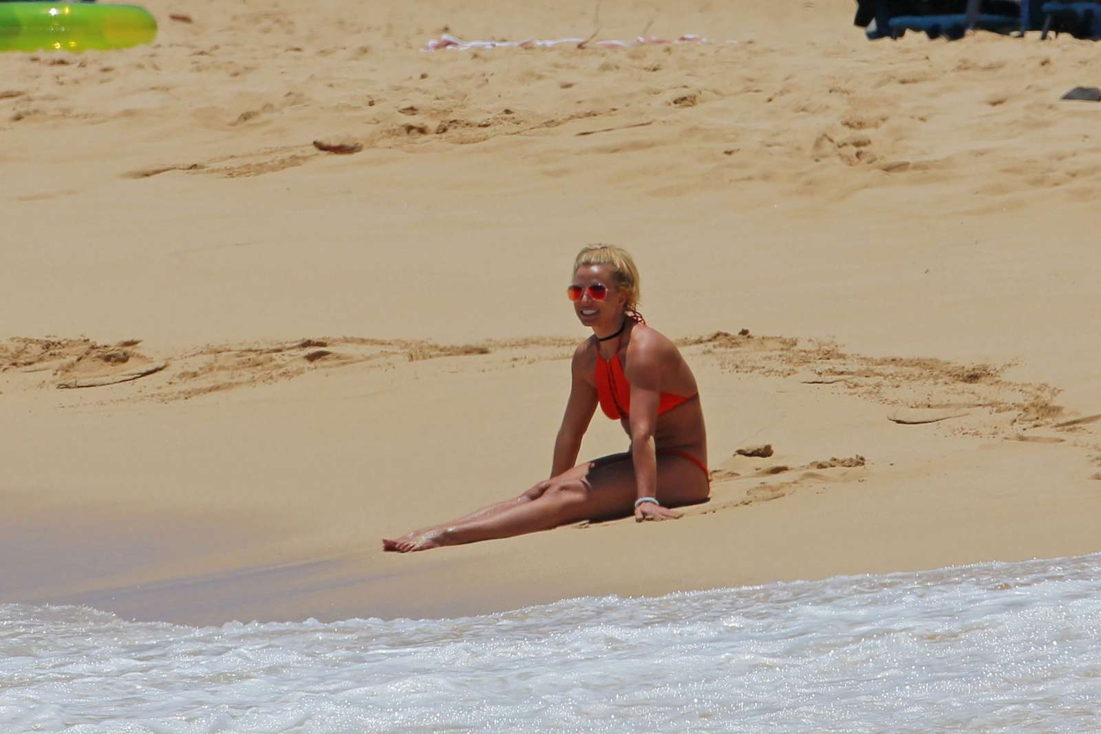 Britney Spears in Red Bikini at a beach in Hawaii