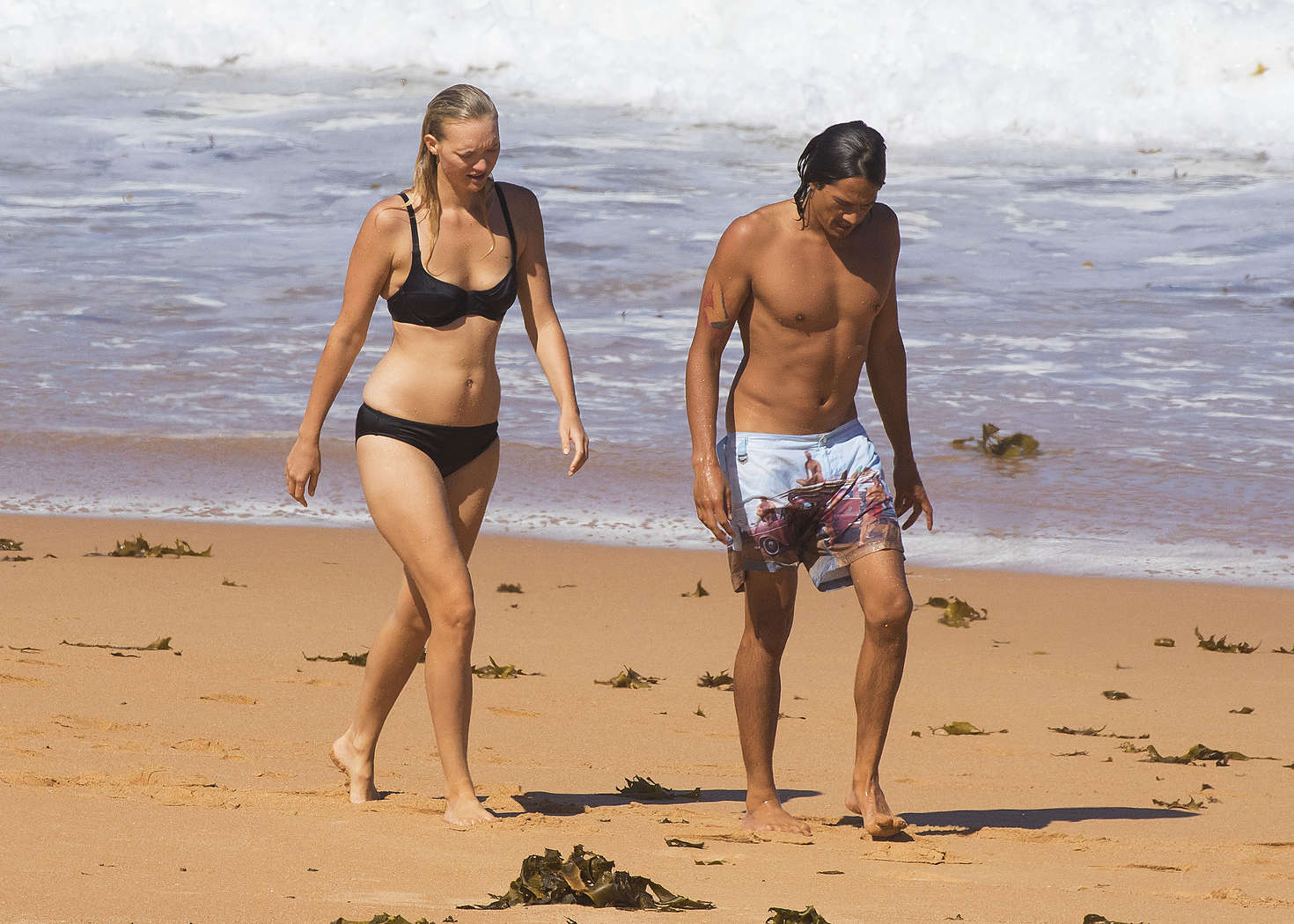 Gemma Ward â€“ Black Bikini Candids at a beach in Sydney