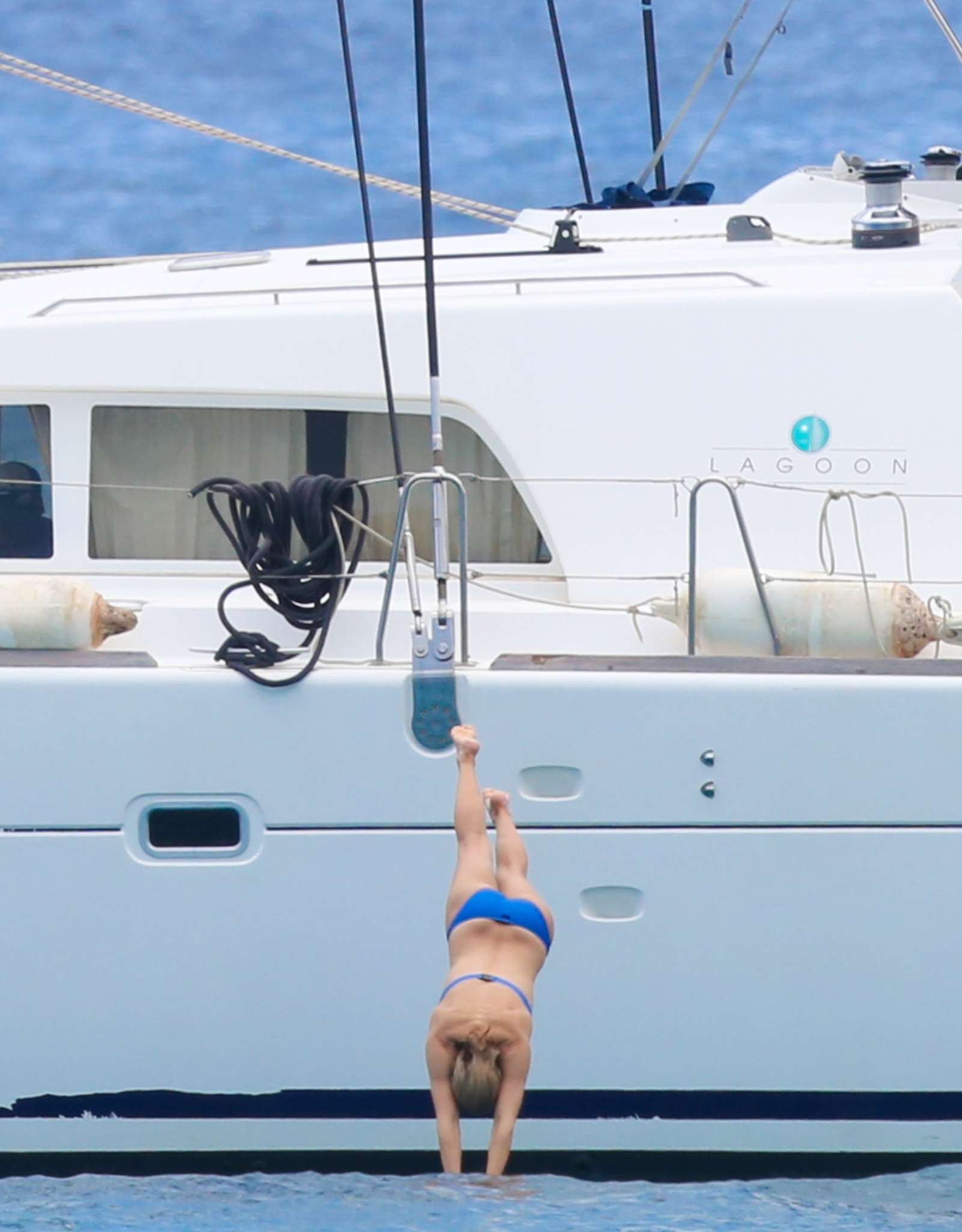 Kate Hudson in Blue Bikini on a yacht in Hawaii