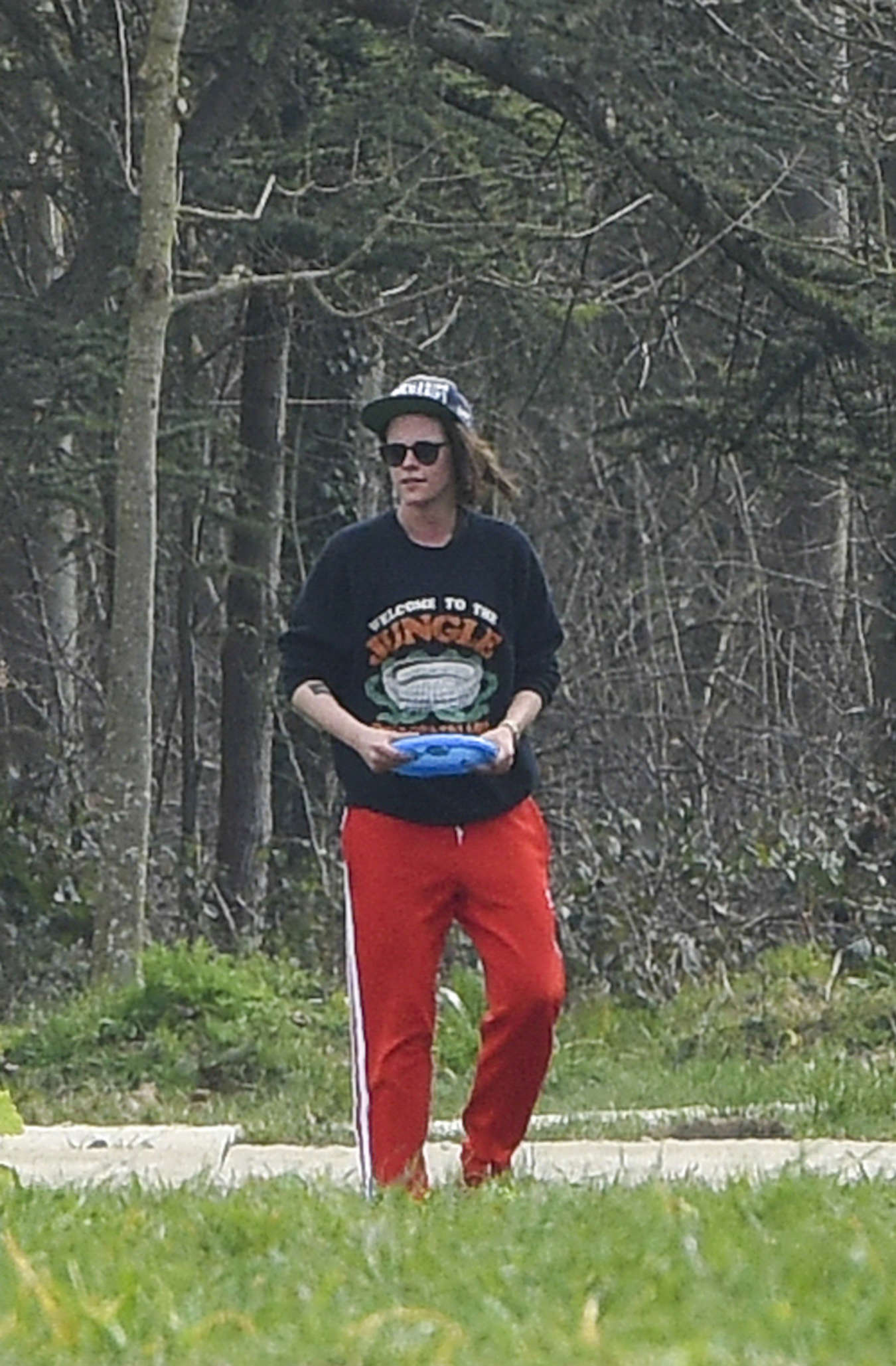 Kristen Stewart with Soko in a park in Paris