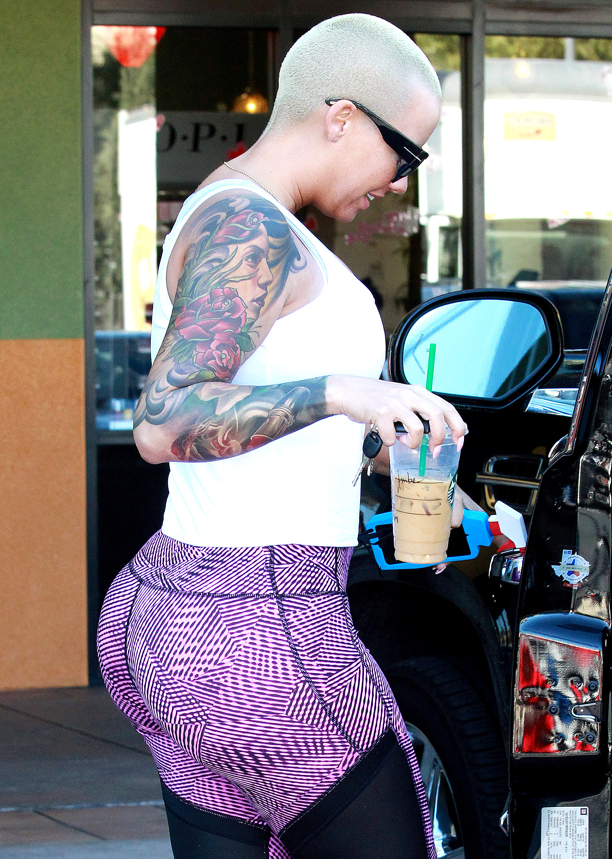 Amber Rose In Purple Tights At Nail Salon In Los Angeles Gotceleb