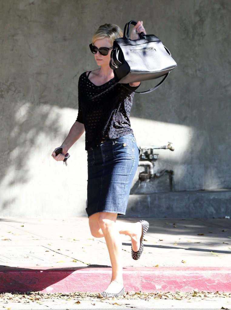 Charlize Theron in Jeans Skirt -11 | GotCeleb