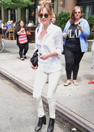 Dakota Johnson in White Pants out in New York