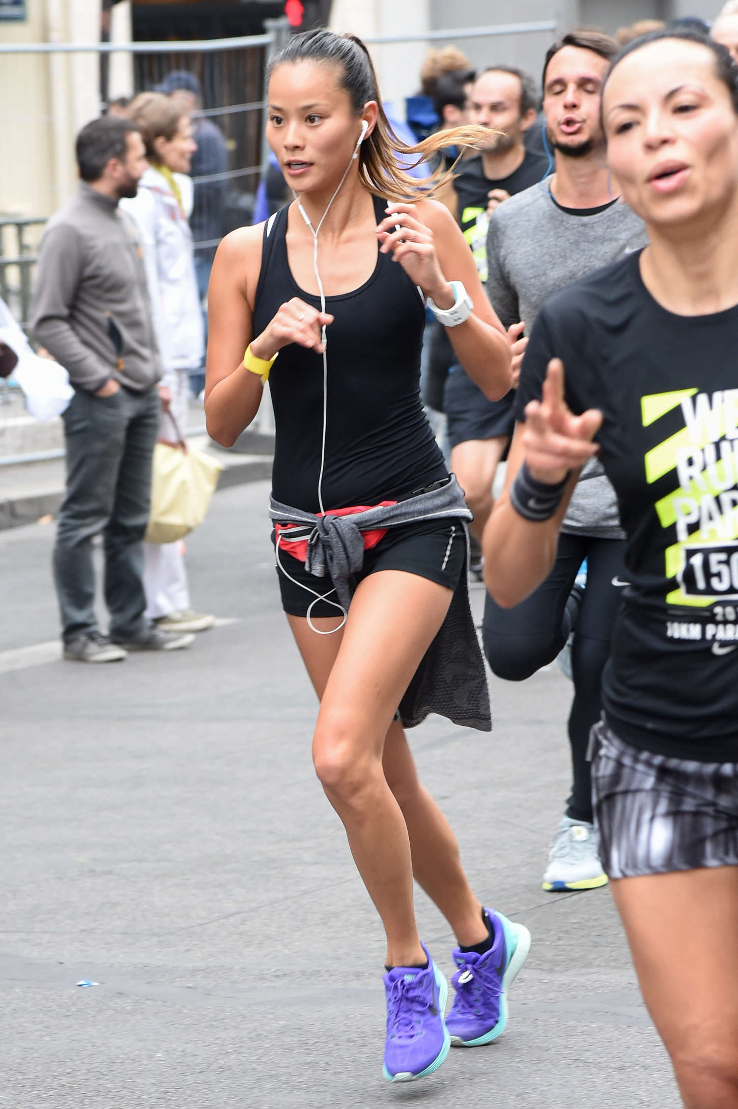 Jamie Chung in Shorts Running in the Nike 10km Paris Centre Marathon -02 |  GotCeleb