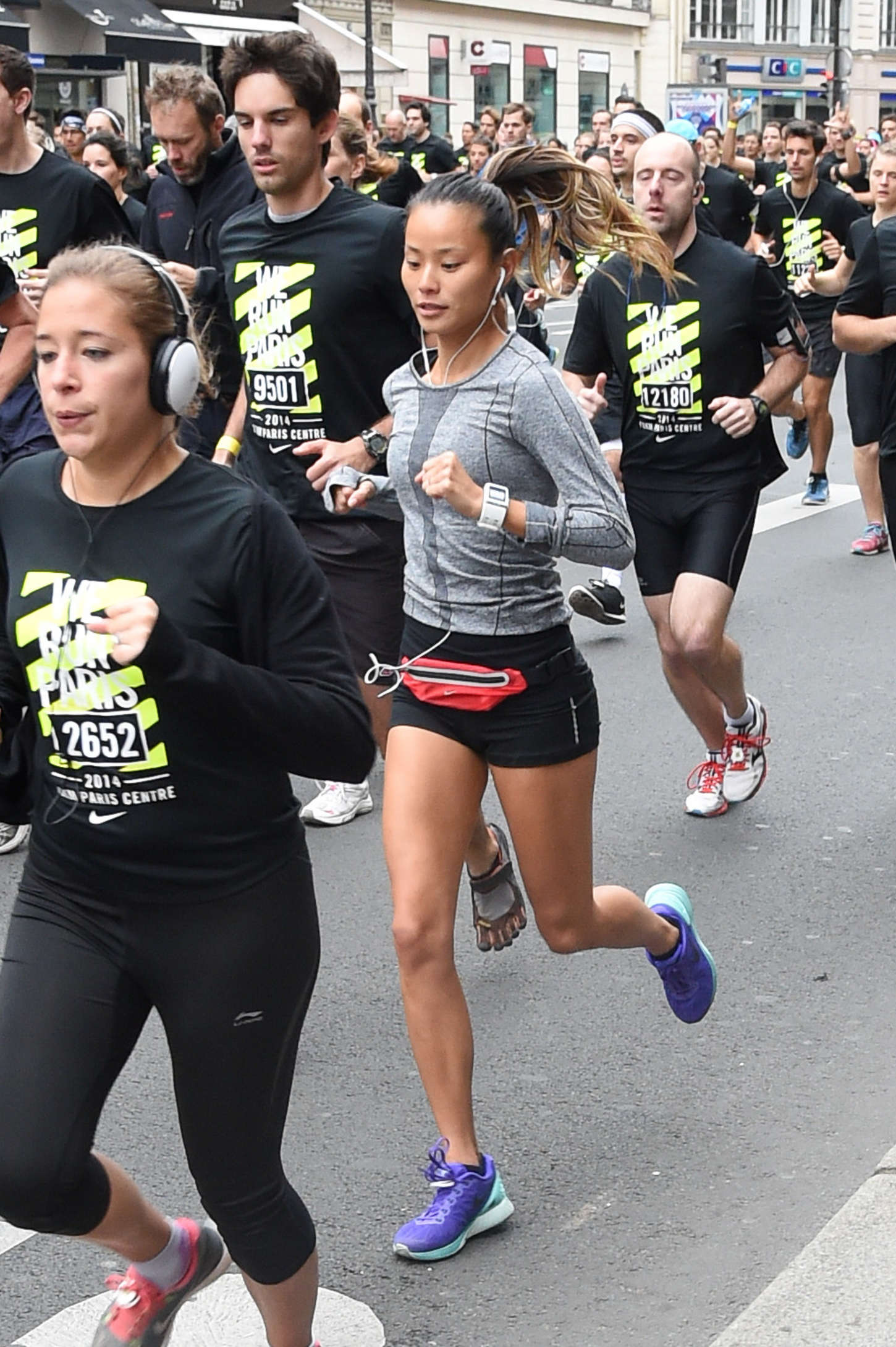 Jamie Chung in Shorts Running in the Nike 10km Paris Centre Marathon -04 |  GotCeleb