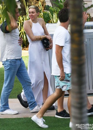 Miley Cyrus in White Dress at a restaurant in Malibu Beach