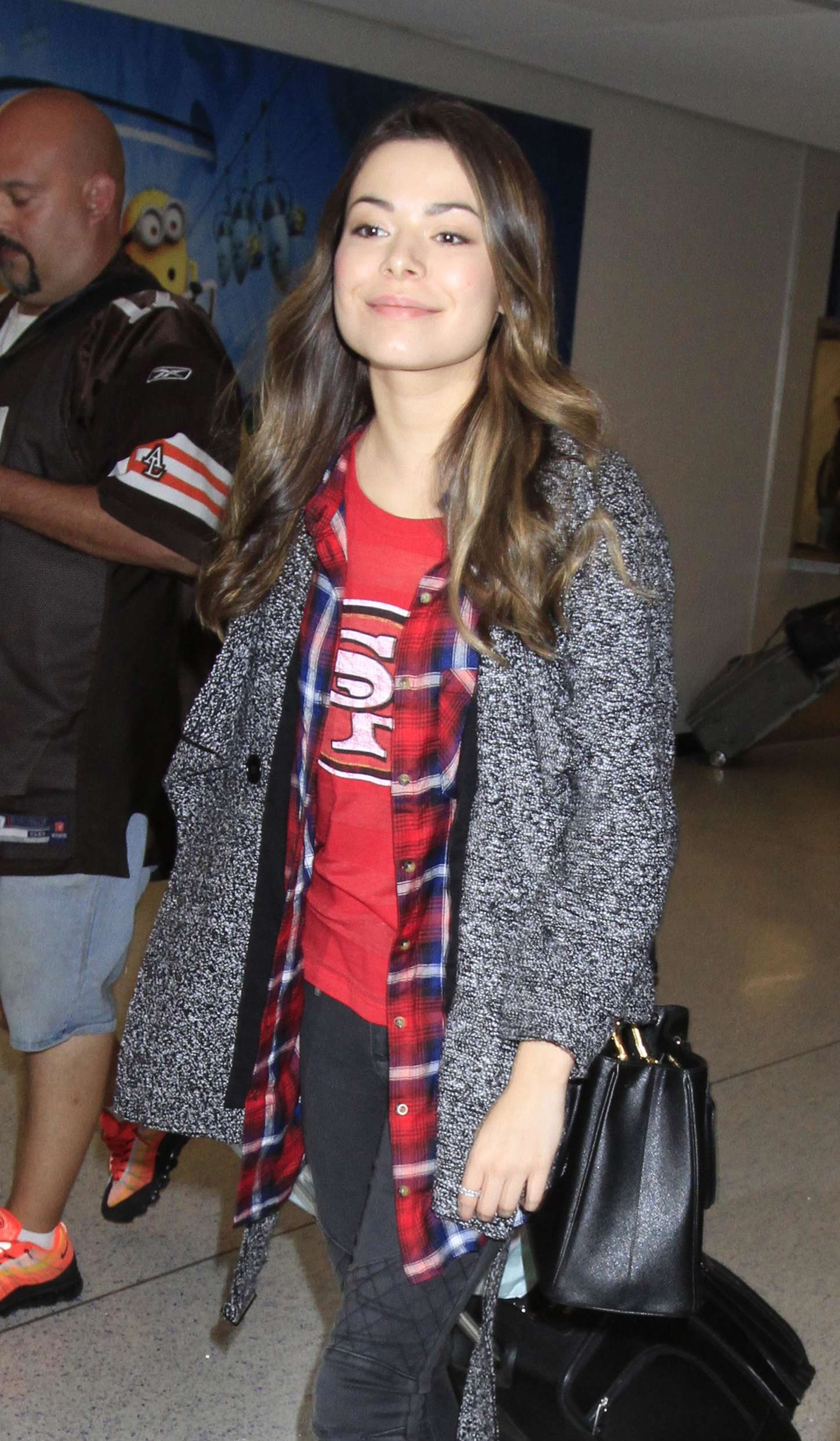 Miranda Cosgrove In Tight Jeans At Lax Gotceleb