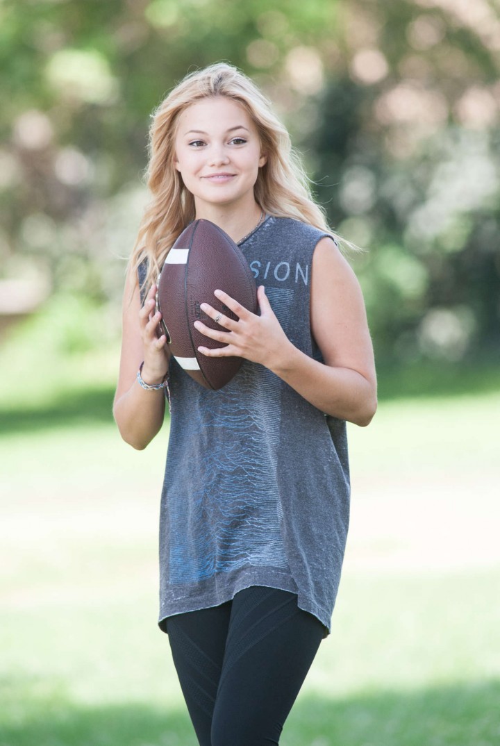 Olivia Holt – Playing Football at a park -23 – GotCeleb