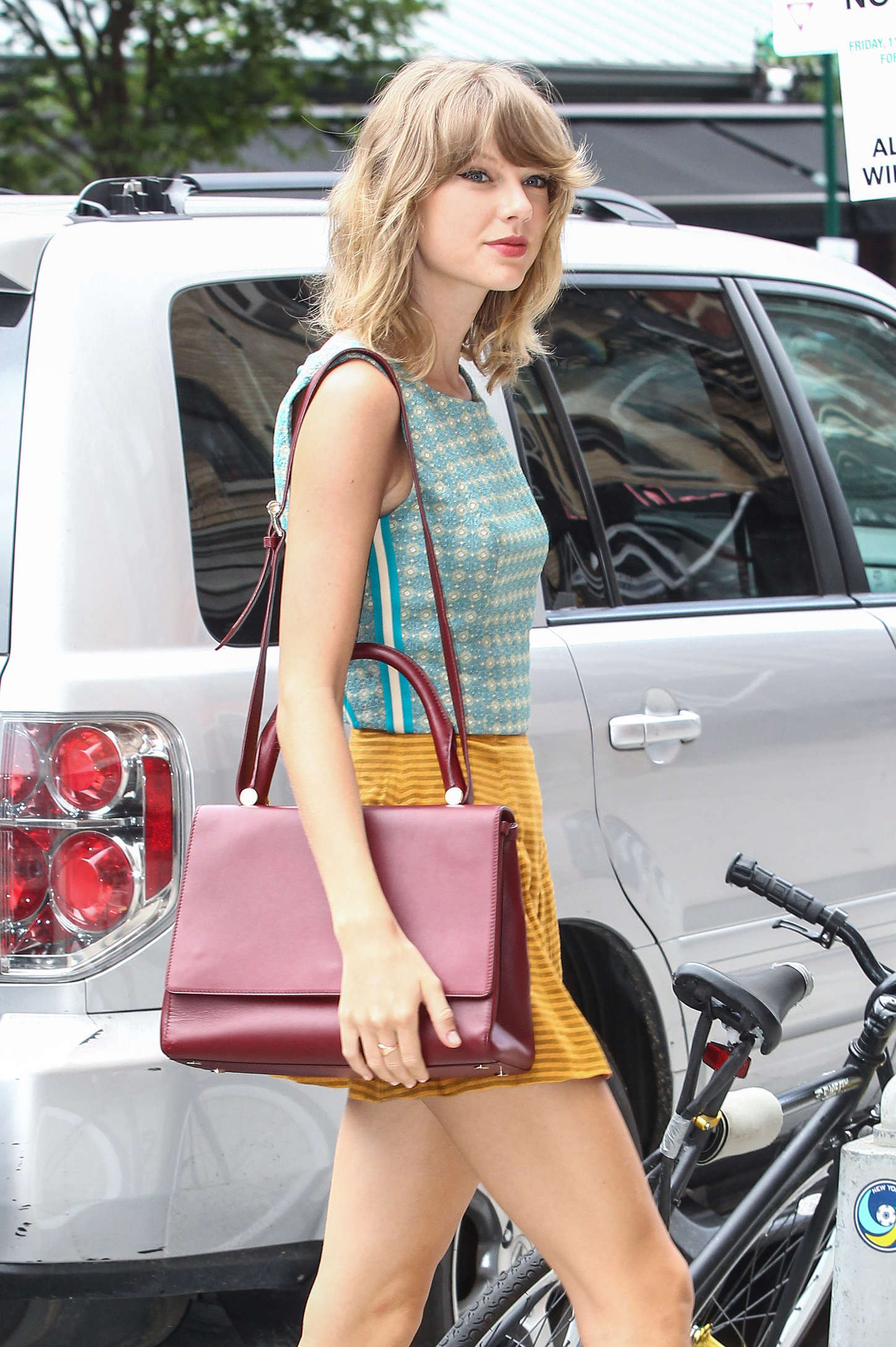 Taylor Swift in Yellow Mini Skirt 07 GotCeleb