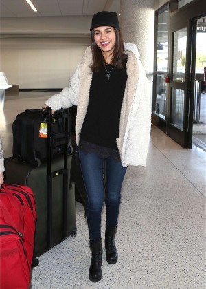 Victoria Justice in Jeans at LAX Airport in Los Angeles