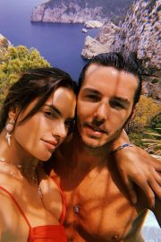 Alessandra Ambrosio and Nicolo Oddi at poolside while on their holidays in Ibiza