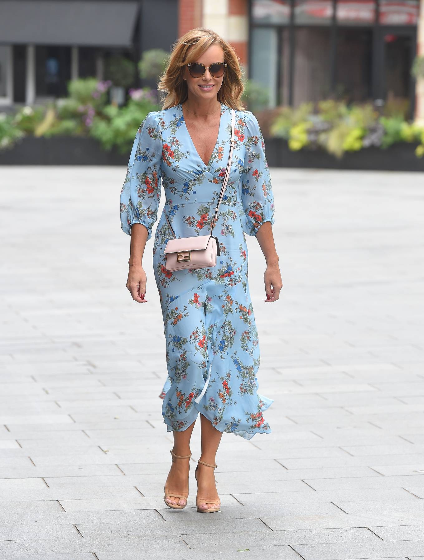 Amanda Holden â€“ Wearing a flower print dress while leaving the Global Radio Studios in London