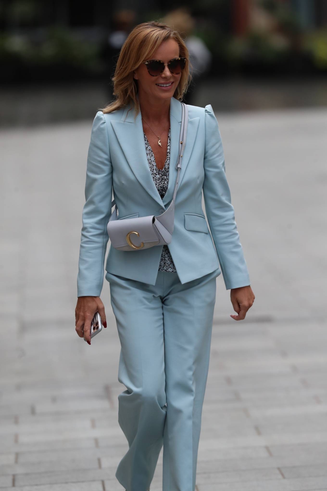 Amanda Holden - Wearing a light blue pantsuit after her Heart radio ...