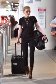 Amber Heard - Arrives at LAX International Airport in LA