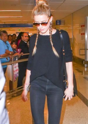 Amber Heard in Black Jeans at LAX in Los Angeles