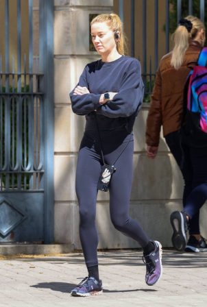 Amber Heard - Seen as she jogs through the streets of Madrid