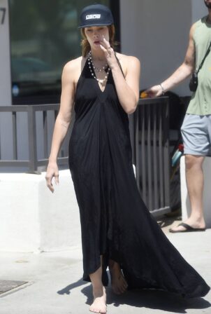 Ashley Greene - Walks barefoot on the beach with her husband Paul Khoury
