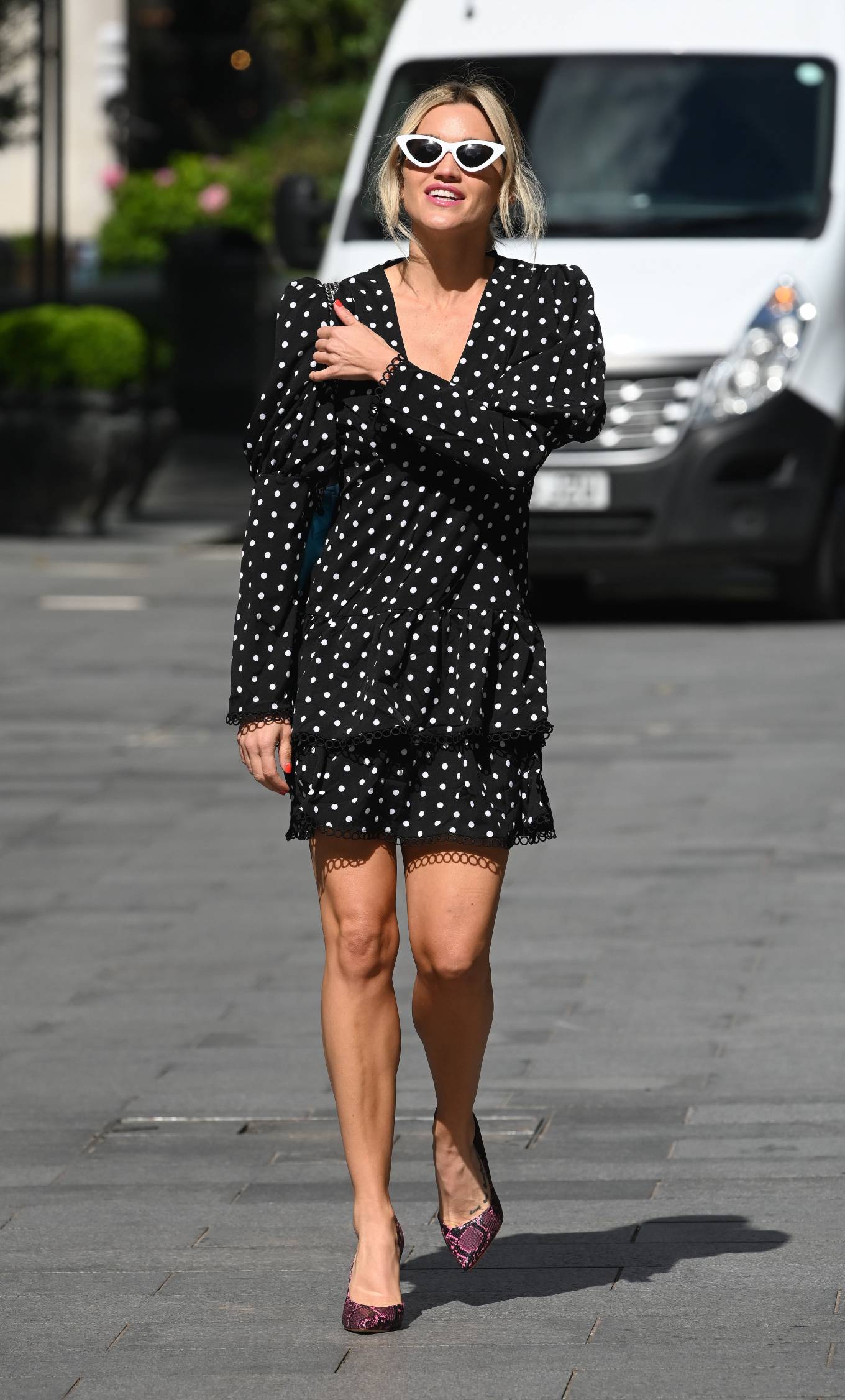 Ashley Roberts – Wears black polka dot dress at Heart radio in London