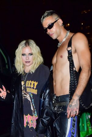 Avril Lavigne - With designer Luis De Javiersteps seen out at the party in New York