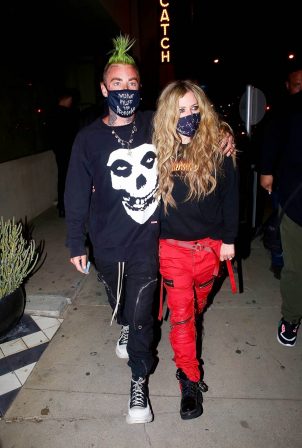 Avril Lavigne - With Mod Sun hold hands after a dinner date in West Hollywood