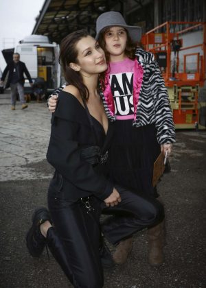 Bella Hadid meets a little fan after the fashion show in Milan