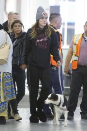 Bella Thorne and boyfriened Alex Martini - Arrives at airport in Toronto