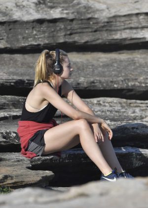 Bridget Malcolm in shorts relaxing time on Bondi Beach