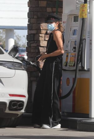 Brooke Burke - Stops at a gas station in Malibu