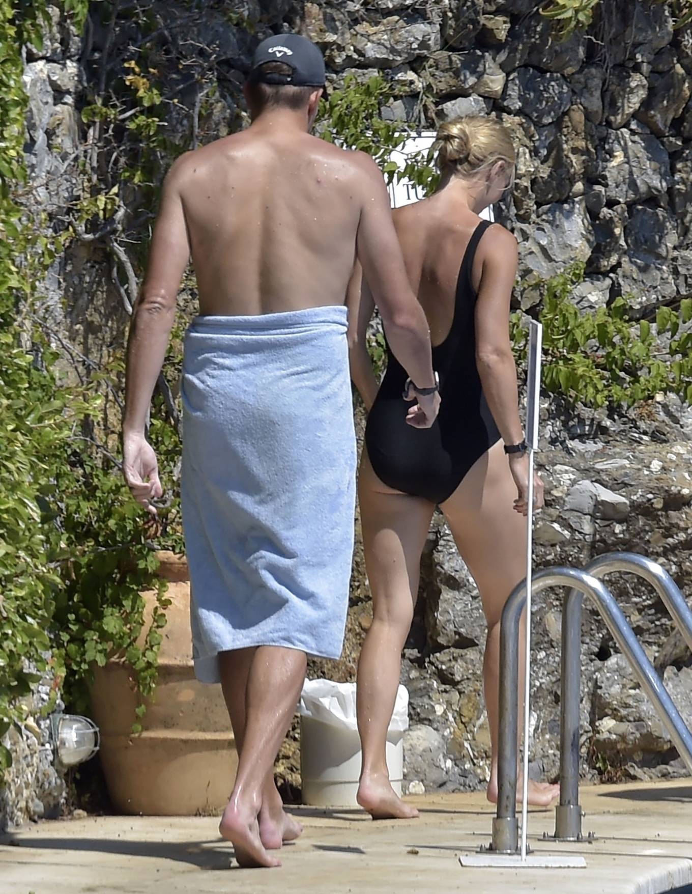 Caroline Wozniacki – In black swimsuit poolside in Portofino