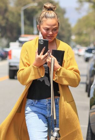 Chrissy Teigen - Is seen during a FaceTime call in Los Angeles