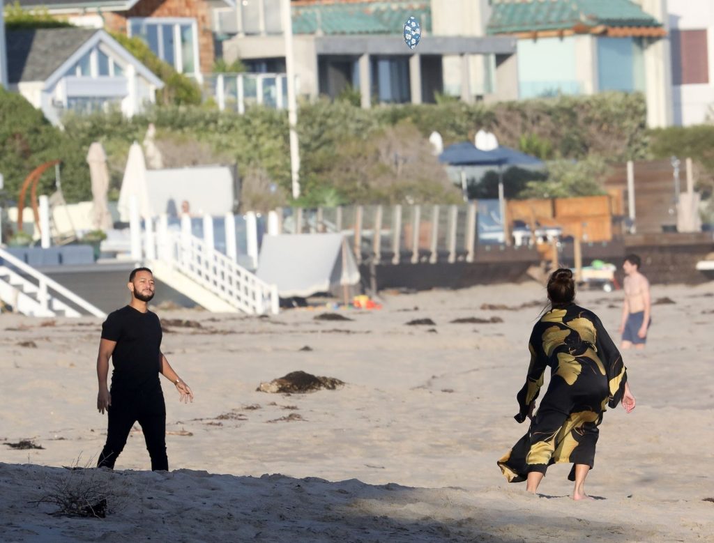 Chrissy Teigen seen on beach in Malibu