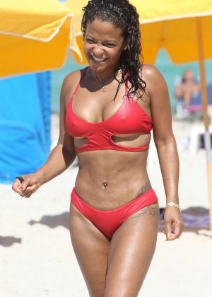 Christina Milian in Red Bikini on the beach in Miami