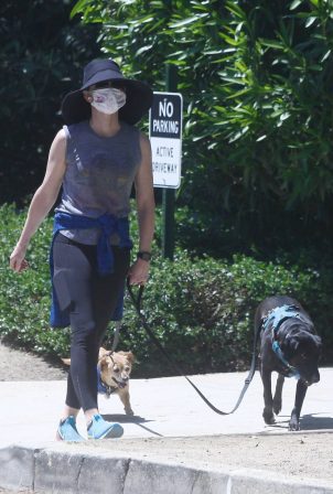 Courtney Thorne-Smith - Takes her pups out for a walk in Palisades