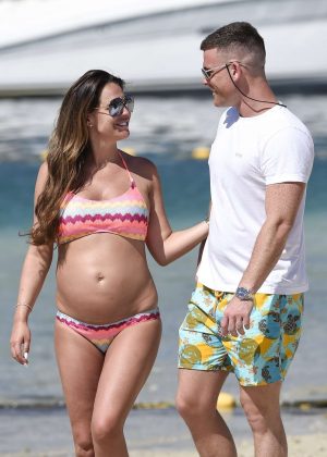 Danielle Lloyd and Michael O' Neil on the beach in Dubai