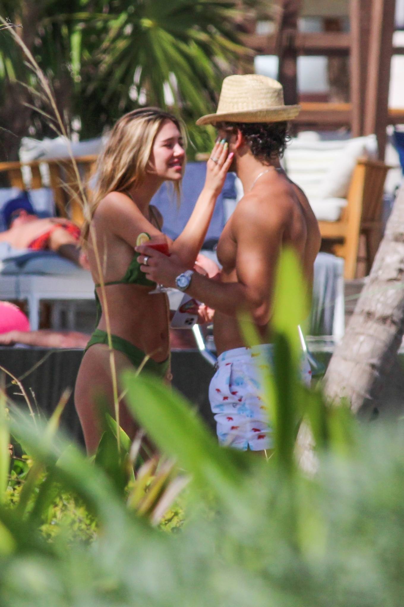 Delilah Belle Hamlin – In bikini with Eyal Booker on the beach in Tulum