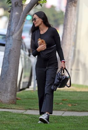 Demi Moore - Seen with her cute Dog Pilaf in Los Angeles