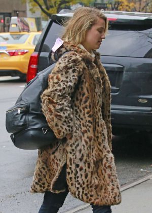 Dianna Agron in a leopard fur jacket in New York