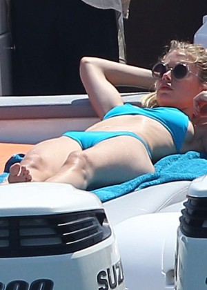 Doutzen Kroes in Blue Bikini on a boat in Ibiza