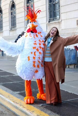 Drew Barrymore - Posing with a chicken in New York