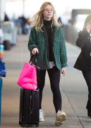 Elle Fanning - Arriving at JFK Airport in NYC