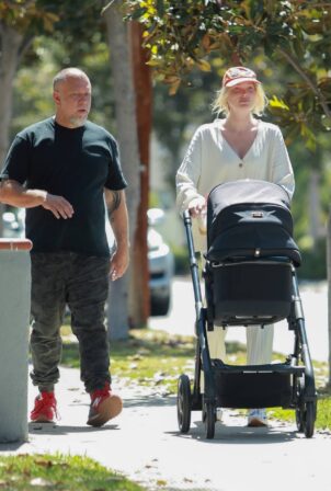 Elsa Hosk - takes a walk with her baby in LA