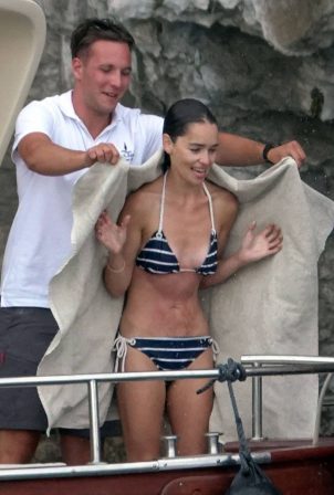 Emilia Clarke - Wearing bikini on vacation in Italy