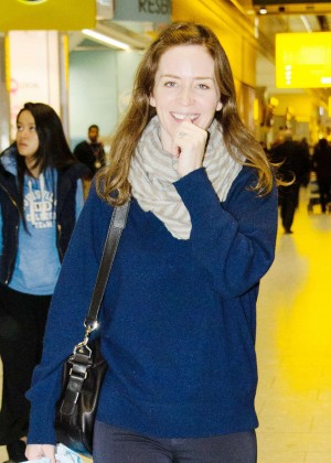 Emily Blunt with her husband at Heathrow Airport in London