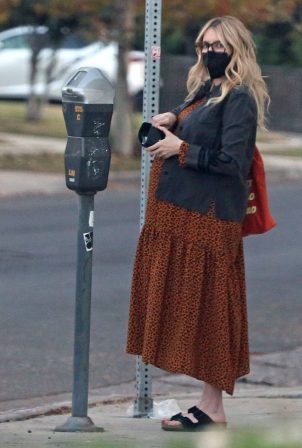 Emma Roberts - Rocks a leopard print dress in Los Angeles
