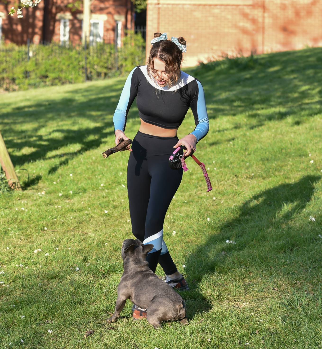 Georgia Harrison â€“ Having fun with her dog at a park in Loughton