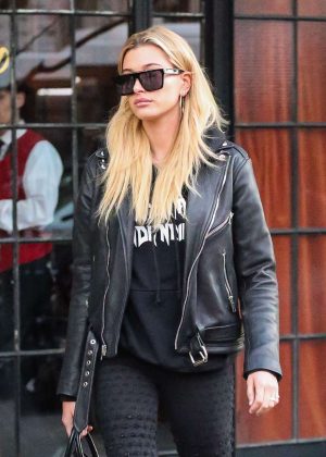 Hailey Baldwin in leather jacket out in New York