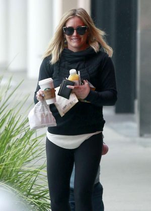 Hilary Duff in tights getting gas in Beverly Hills