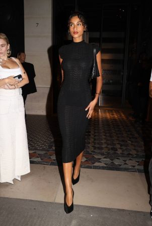 Imaan Hammam - In a black dress during Paris Fashion Week