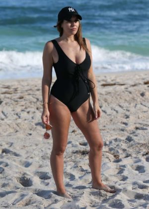 Imogen Thomas in Black Swimsuit at a Beach in Miami
